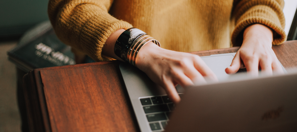 Woman Typing on a Computer